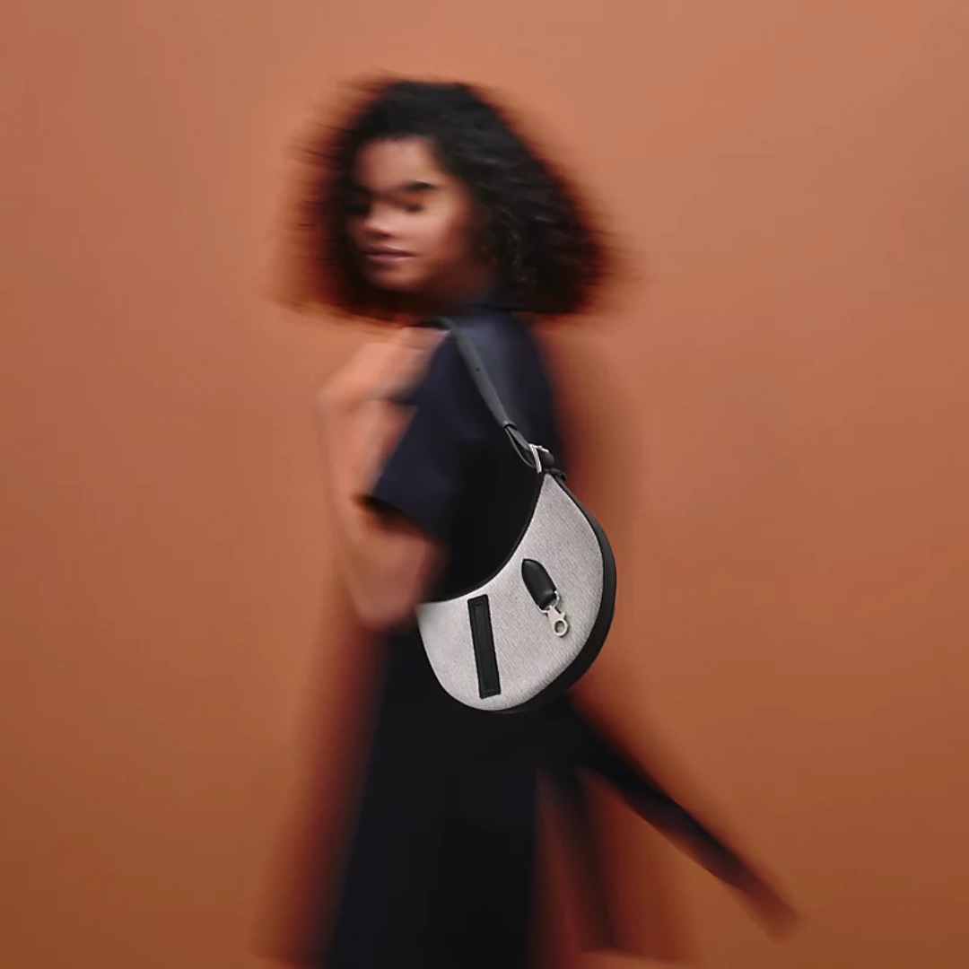 SMALL SADDLE BAG MADE OF FABRIC AND LEATHER FROM HERMÈS