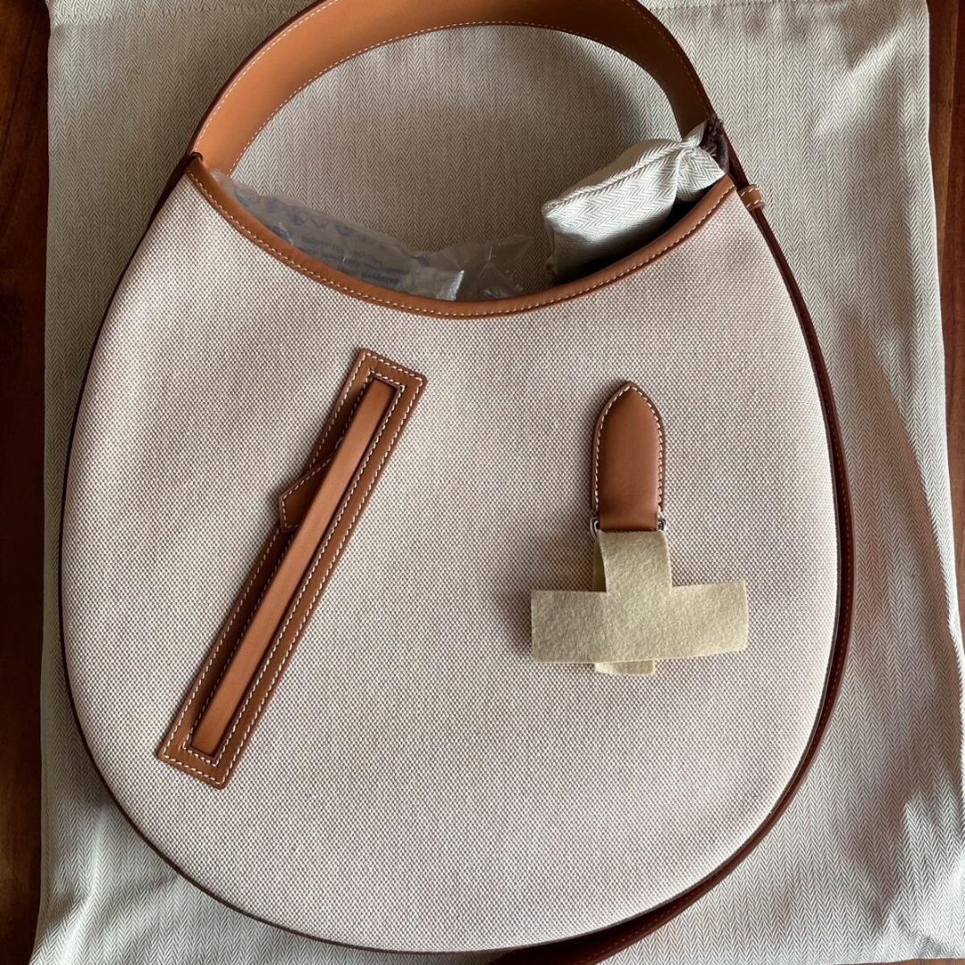 SMALL SADDLE BAG MADE OF FABRIC AND LEATHER FROM HERMÈS