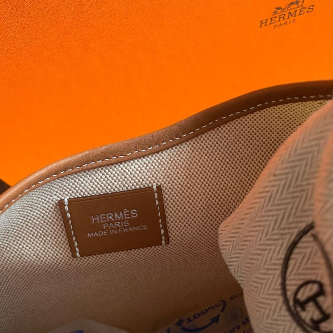 SMALL SADDLE BAG MADE OF FABRIC AND LEATHER FROM HERMÈS