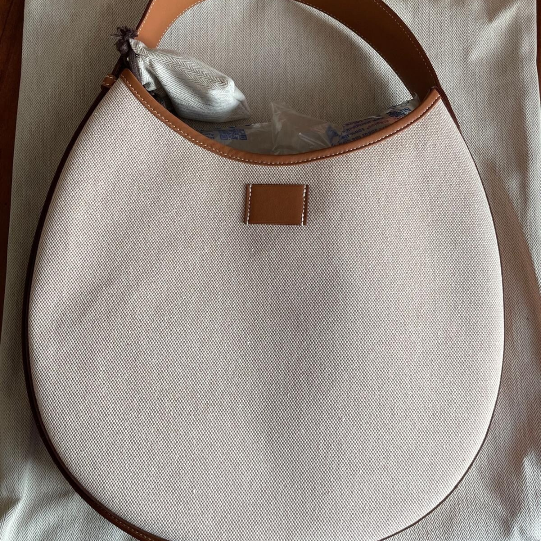SMALL SADDLE BAG MADE OF FABRIC AND LEATHER FROM HERMÈS